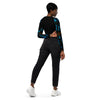 dos et jean noir - Crop Top Lycra Femme Manche Longue Recyclé SPF50 Benitier Bleu 2 - Couleurs Lagon