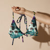 avant sur bras - Haut de bikini éco-responsable rembourré UPF50+ Noir Floral Libellule - Couleurs Lagon