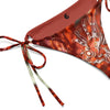 gros plan avant et doublure rouge - Bas de Bikini String Doublé Rouge Recyclé UPF50+ Gorgone Dragon Fish - Couleurs Lagon