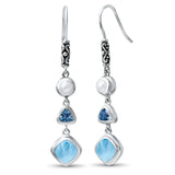 Boucles d'oreilles pendantes larimar et perle en argent 925 sur fond blanc