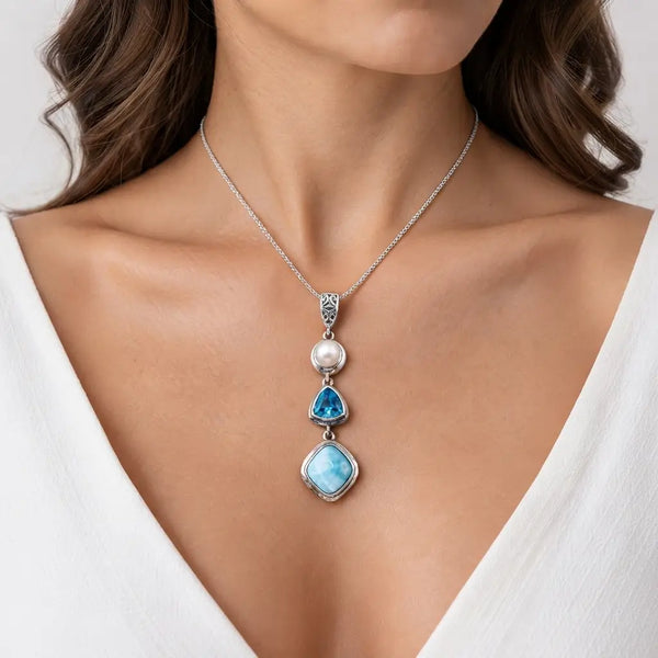 Pendentif larimar argent 925 et perle, pierre bleu lagon veinée de blanc - presentation