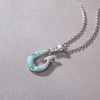 Pendentif hameçon larimar naturel — gros plan pierre bleu lagon argent massif