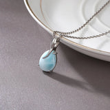 Pierre larimar naturelle bleu ciel — détail pendentif solitaire