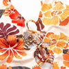 gros plan attache criss-cross avant - Monokini Push-Up V Plongeant Dos Nu Criss-Cross Floral Orange - Couleurs Lagon