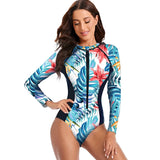 avant main sur la hanche - Couleurs Lagon - Combi Surf Manches Longues Push-Up Zip Avant Floral Palmier BLEU HIBISCUS