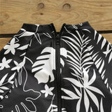 détails col et zip - Combi Surf Manches Longues Push-Up Zip Dos Palmier NOIR ET BLANC - Couleurs Lagon