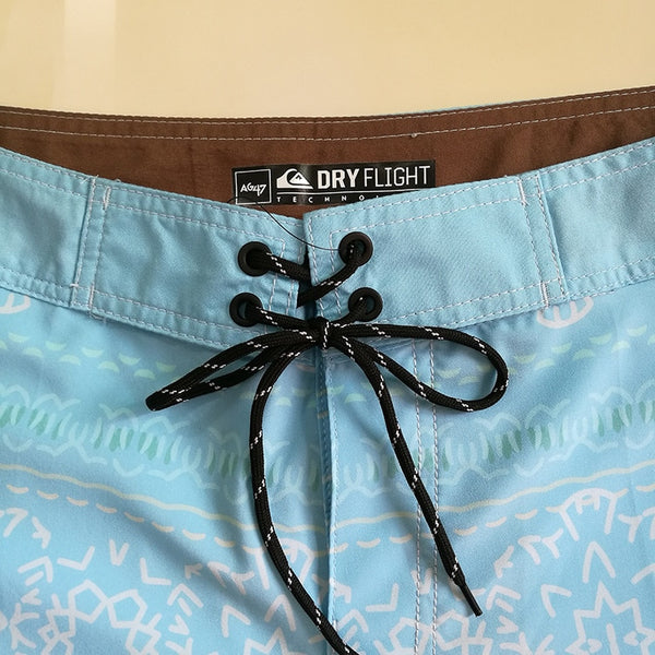 Couleurs Lagon - Bermuda de plage Boardshort Surf Quicksilver pour Hommes