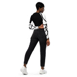 dos et jean noir - Crop Top Lycra Femme Manche Longue Recyclé SPF50 Nautile Blanc - Couleurs Lagon