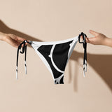avant - Bas de Bikini String Doublé Noir Recyclé UPF50+ Nautile - Couleurs Lagon
