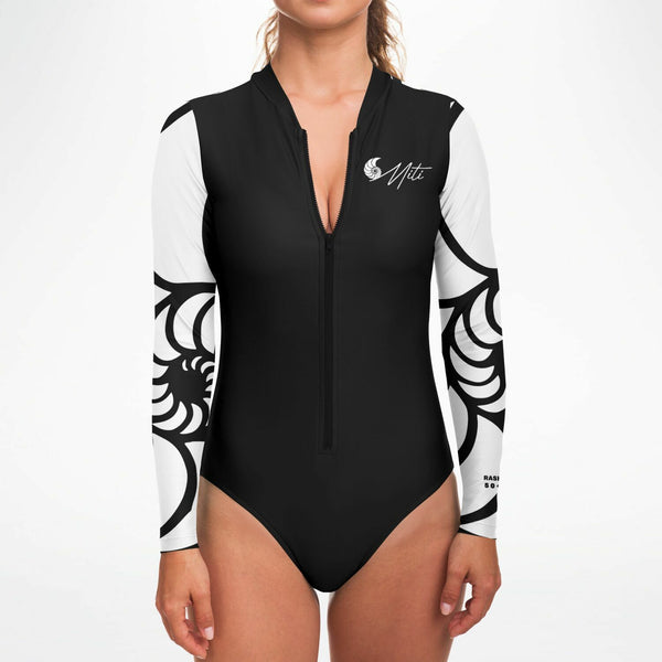 Combinaison surf femme MITI Nautile Blanc zoom zip avant — détail tissu UPF50+ Couleurs Lagon