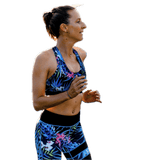 Brassière de sport et legging femme Couleurs Lagon coloris noir floral, portés par Moea en mouvement