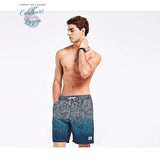 Boardshort surf natation homme bleu nuit géométrique — Couleurs Lagon Pacifique