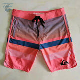 Boardshort Surf Quicksilver QuickDry Grande Taille à rayures turquoise et rouge - Couleurs Lagon