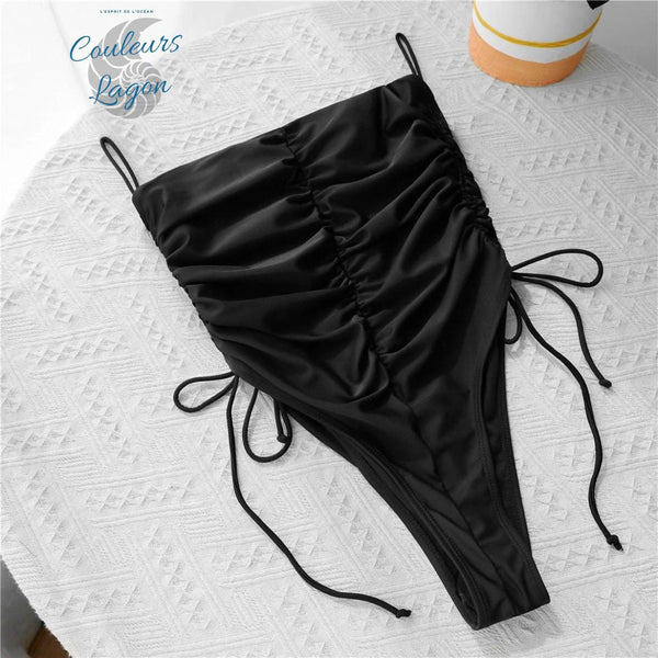 Monokini Noir Sexy Dos Nu et Bretelles Ajustable BLACKBIRD - Couleurs Lagon - avant sur table