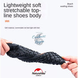 Chaussures aquatiques Naturehike en situation surf et snorkeling | Couleurs Lagon