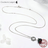 sur table - Pendentif Anneau et Perle Noire Ag 925 - Couleurs Lagon
