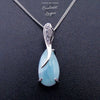 sur fond noir - Pendentif Goutte d'eau Larimar naturelle et argent massif - Couleurs Lagon